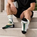 oakland-athletics-socks-custom-nautical-icons-green-white-best-selling.webp